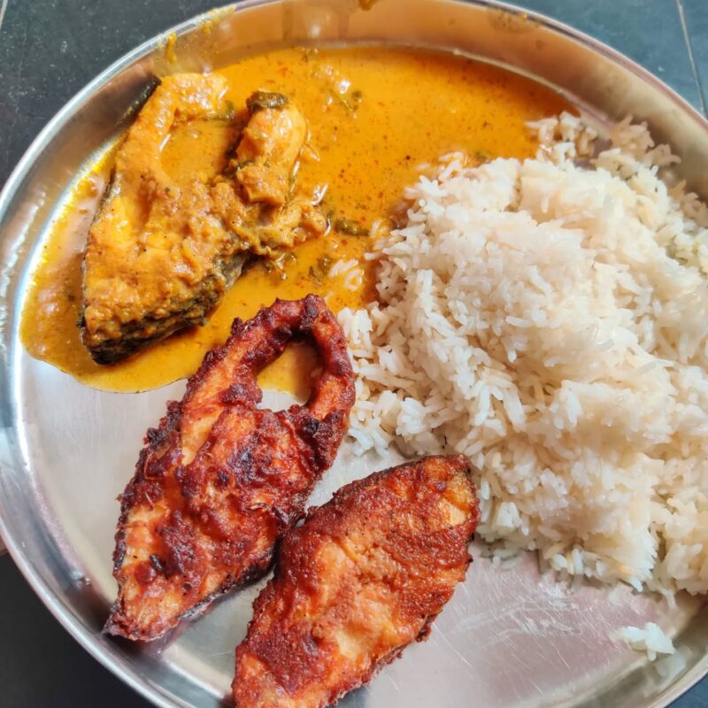 Fresh vanjaram fry served with rice and meen kuzhambu in Tamil Nadu